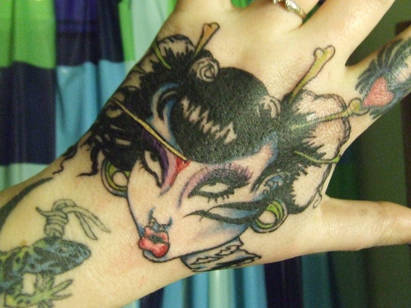 female with tattoo
