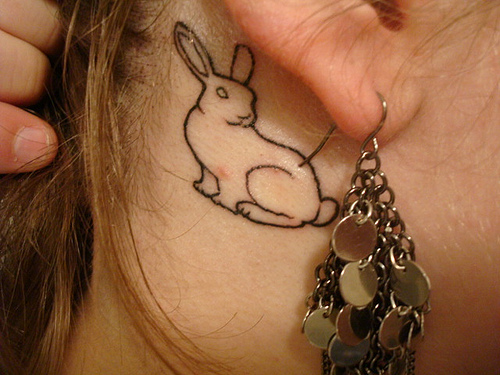 Labels: rabbit tattoo behind ear