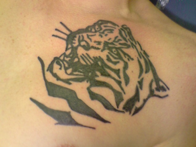 Tribal tiger tattoo - chest tattoo