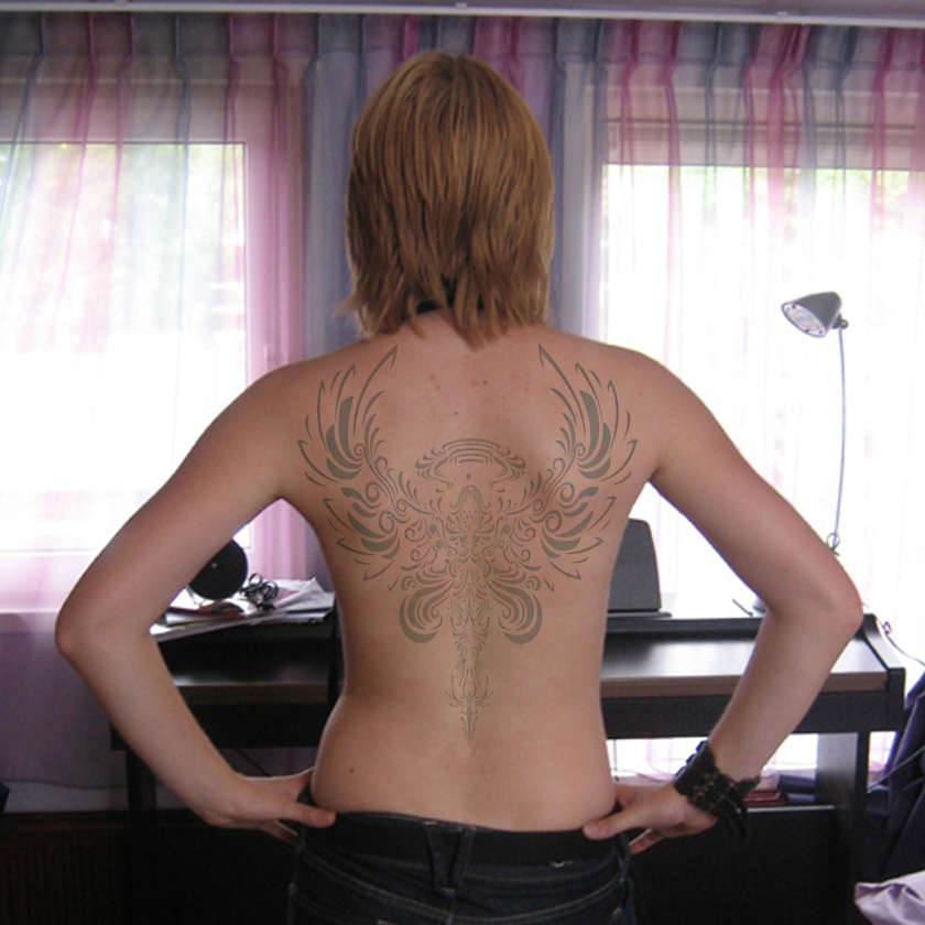 Anna tattoo on back