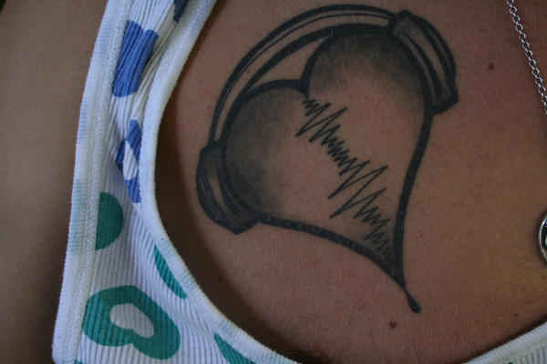 chest tattoos for men. Chest audio heart