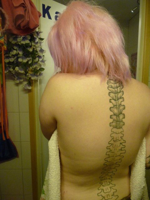 flower tattoos on spine. Back Tattoo Down Spine.