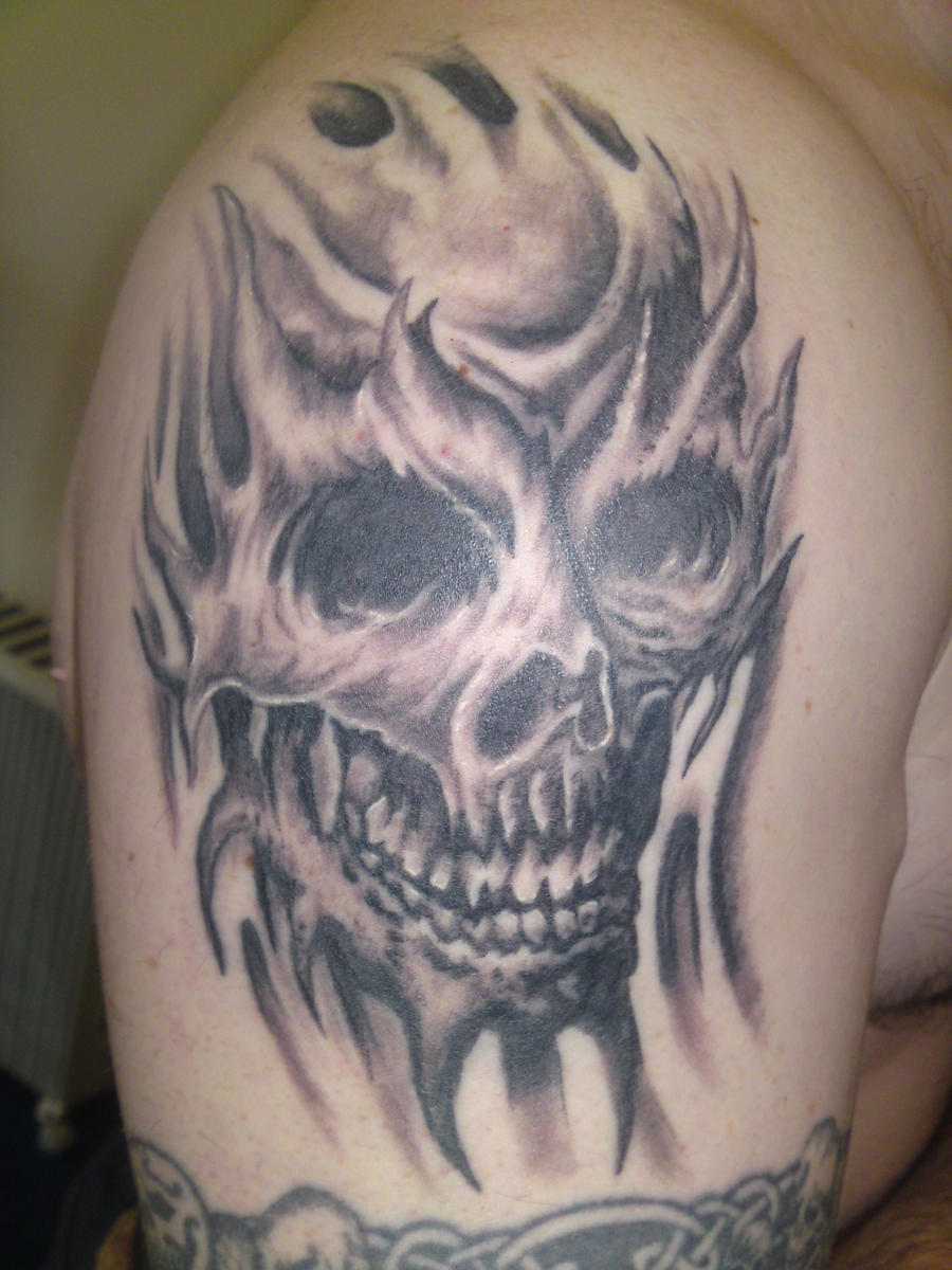 Skull tattoo by