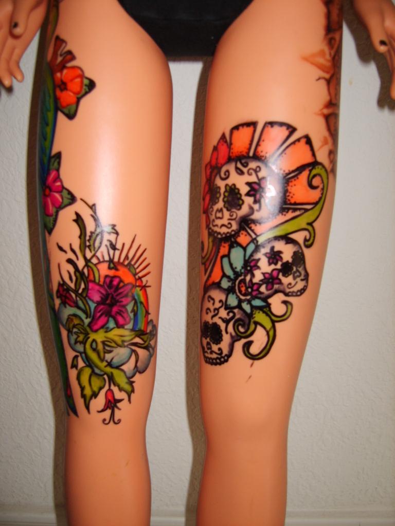 tattoos on leg of flowers