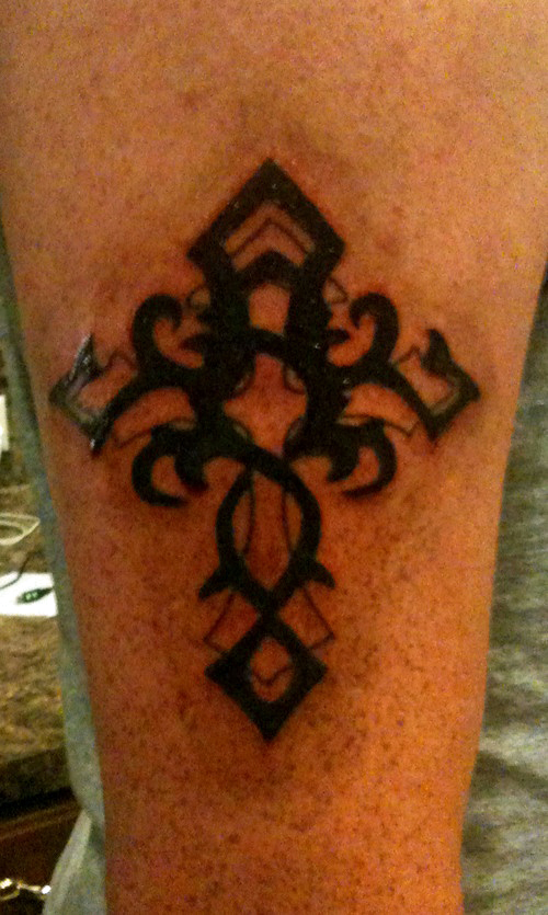cross tattoos with wings on arm. cross tattoo designs