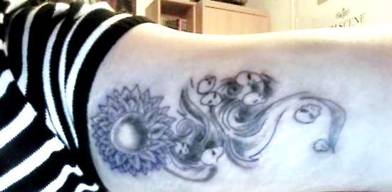 sunflower tattoo back. Sunflower Tattoo