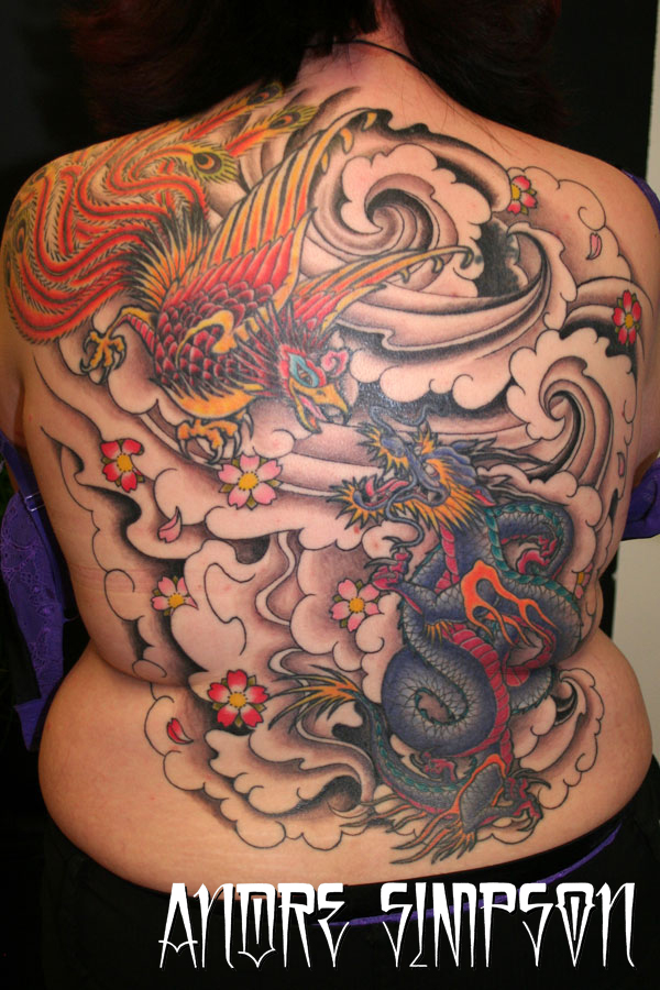 Phoenix and dragon back tattoo