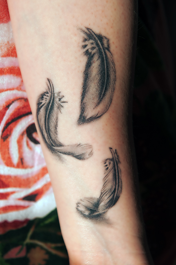 feathers tattoo. Fine Again Feathers Tattoo