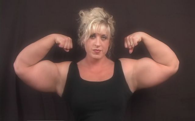 female_bodybuilder_flexes_her_huge_biceps_by_musclewomen-d4kdtty.jpg